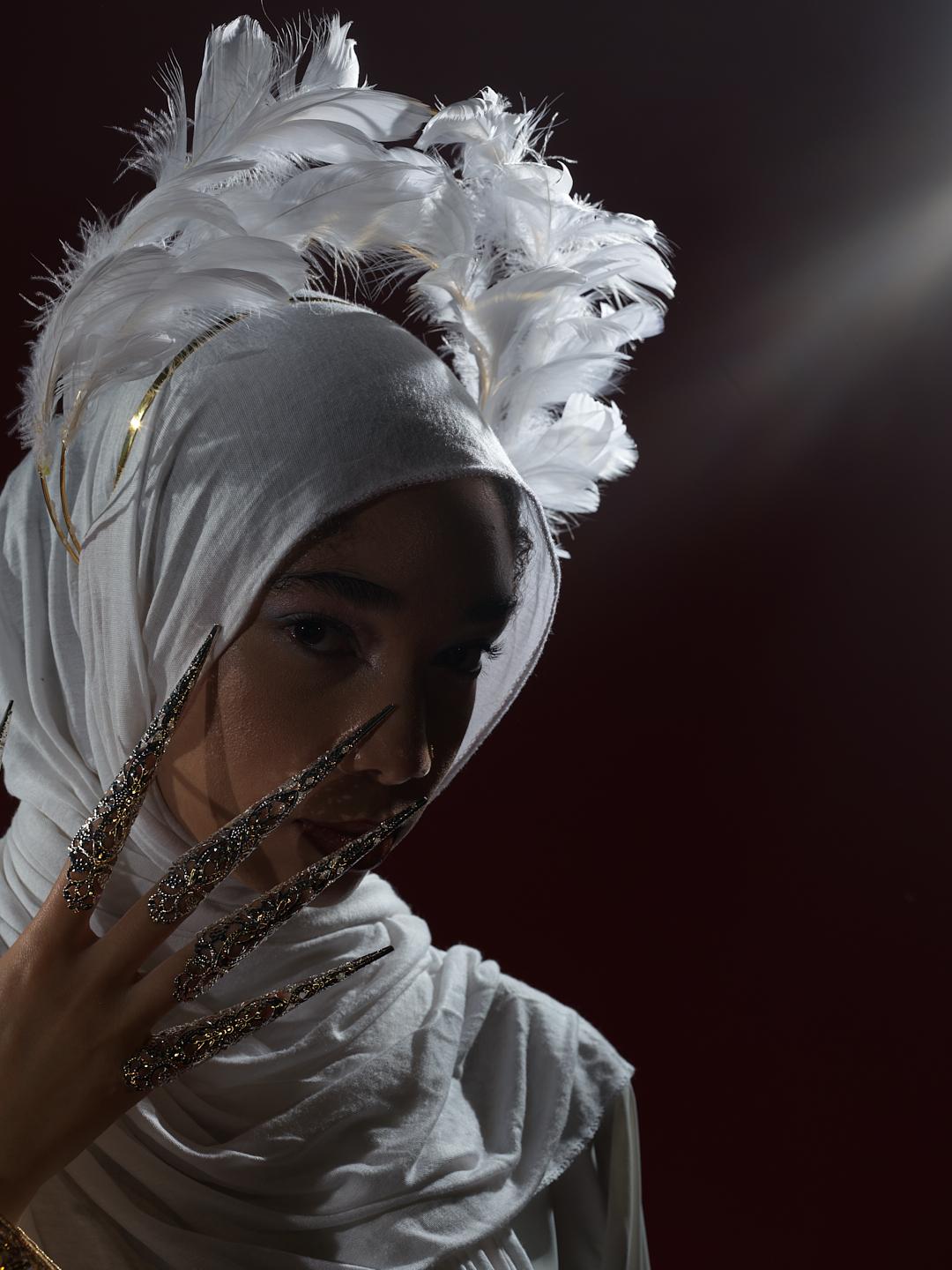 Working with a fashion student to help bring her ideas to life in the form of a portrait.